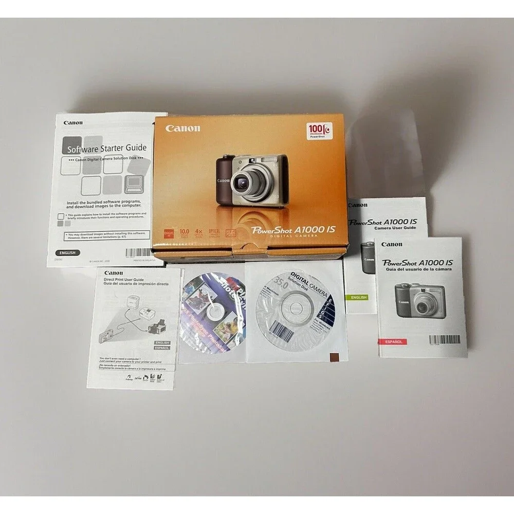 Canon PowerShot A1000 IS Empty Box Manuals CDs Wrist Strap ONLY NO CAMERA